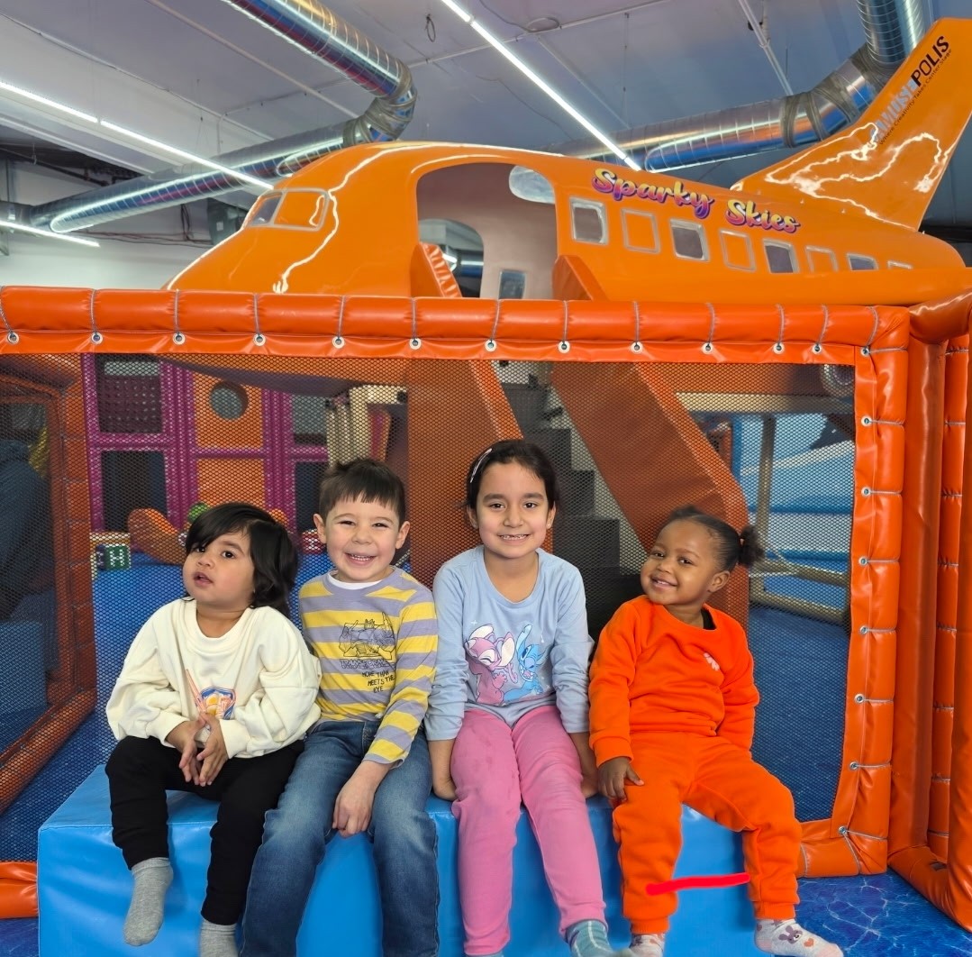 Children celebrating together at KidVenture World