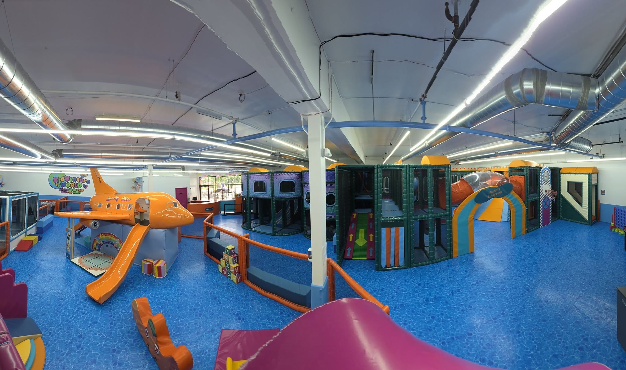 Panoramic view of the colorful KidVenture World indoor playground
